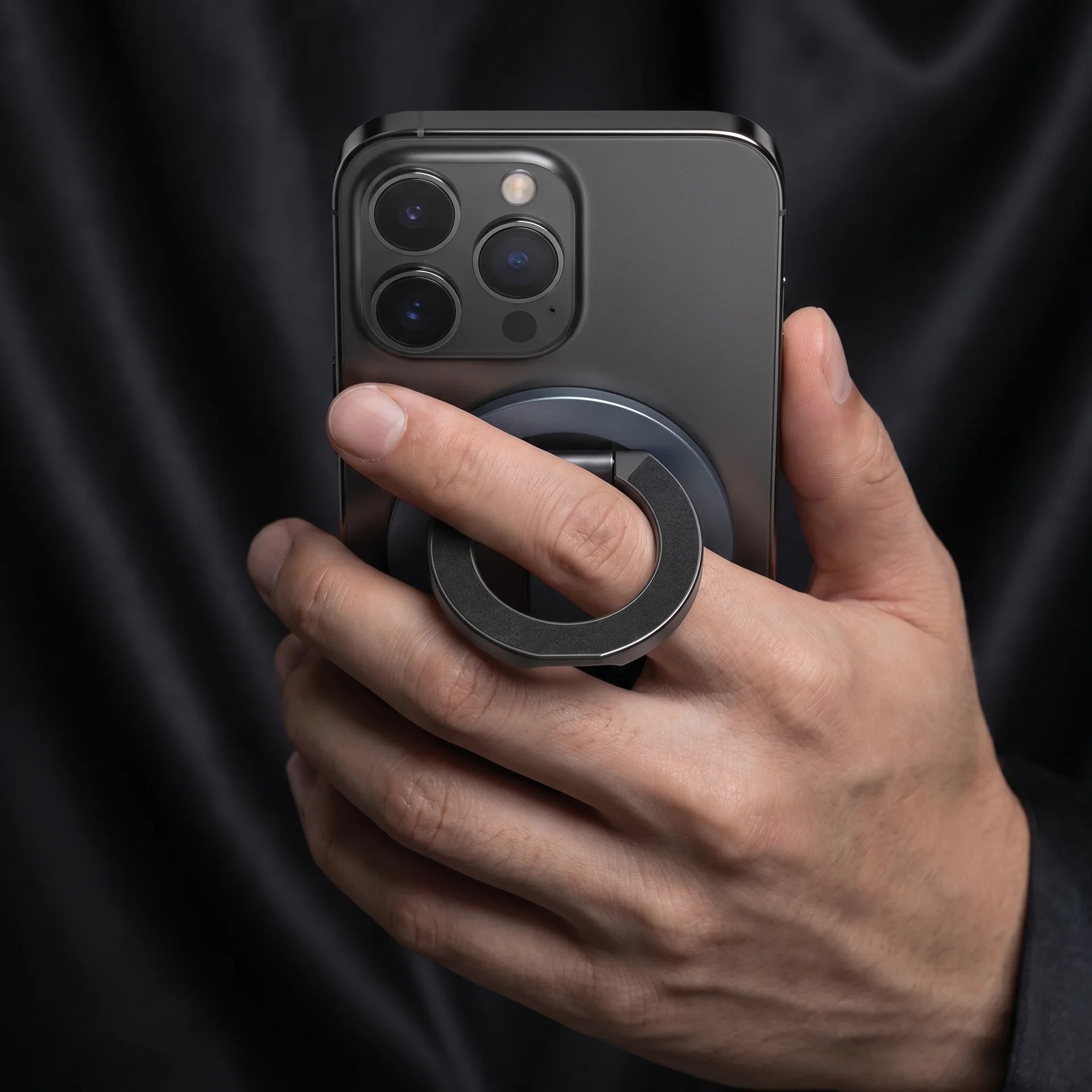 KLICK phone ring used as secure finger grip